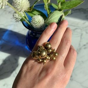 Gold bauble ring.
